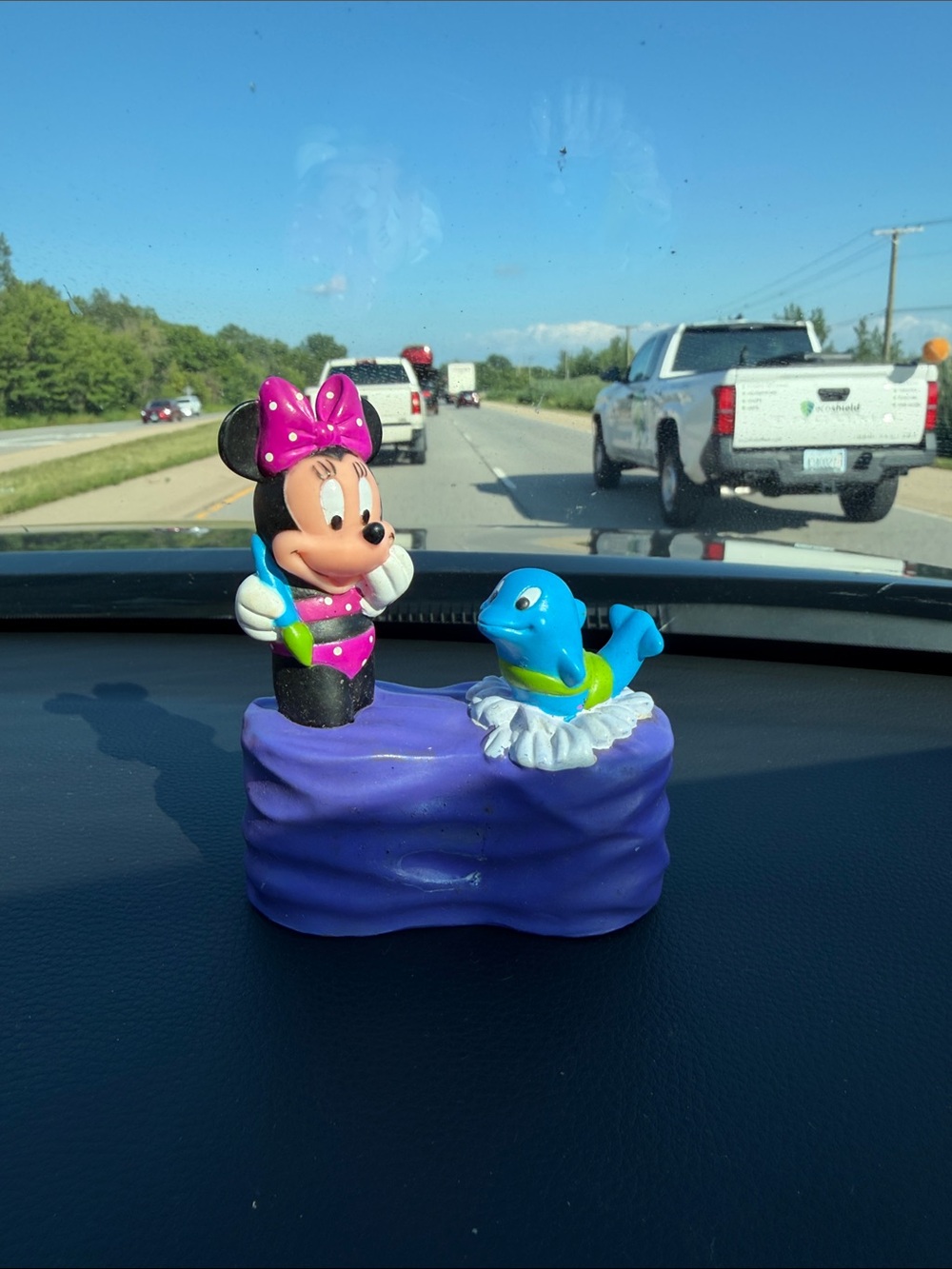 vintage Disney Minnie Mouse and dolphin bath toy set featuring a purple base